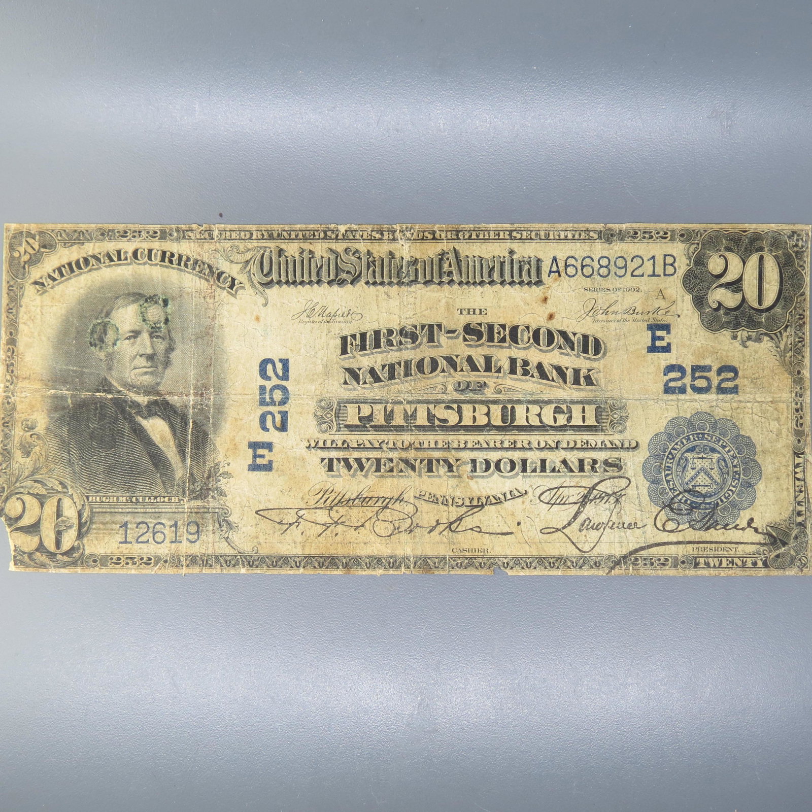 1902 $20.00 National Currency Note,: Pittsburgh, Pennsylvania, well circulated with corner loss and other issues.