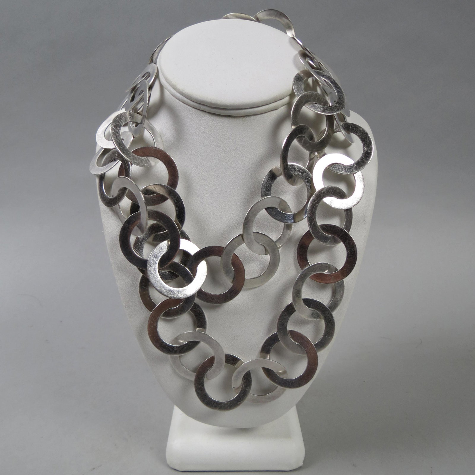 Sterling Silver Necklace,: 1" flat circle links, 39" long, signed S.C.C., MMA, 177 grams.