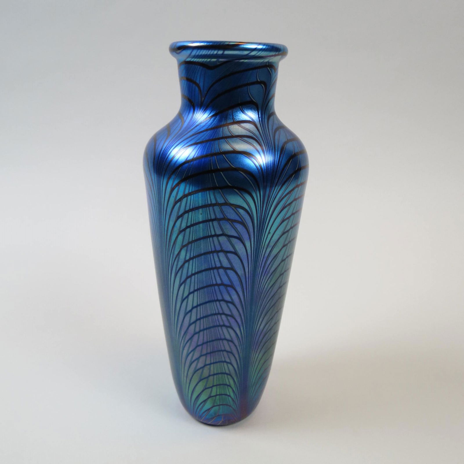 Orient & Flume Art Glass Vase,: fine feather decoration on iridescent blue, 10 1/4", signed and dated 1977, excellent....Orient & Flume produces fine art glass for the collector. These signed pieces capture nature's inspiration in b