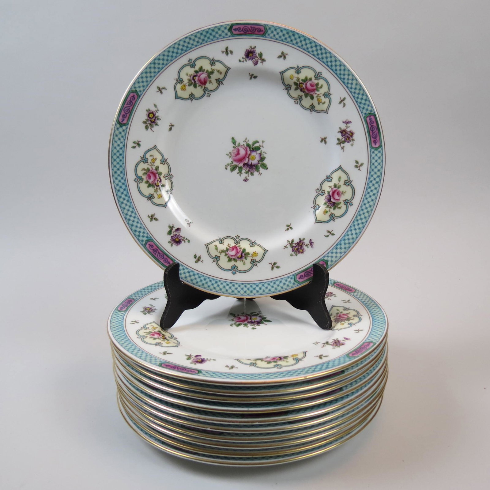 11 Crown Staffordshire Bone China Dinner Plates,: floral sprays, fancy border, gold trim, 10 1/4", one has tiny rim flake, rest excellent.