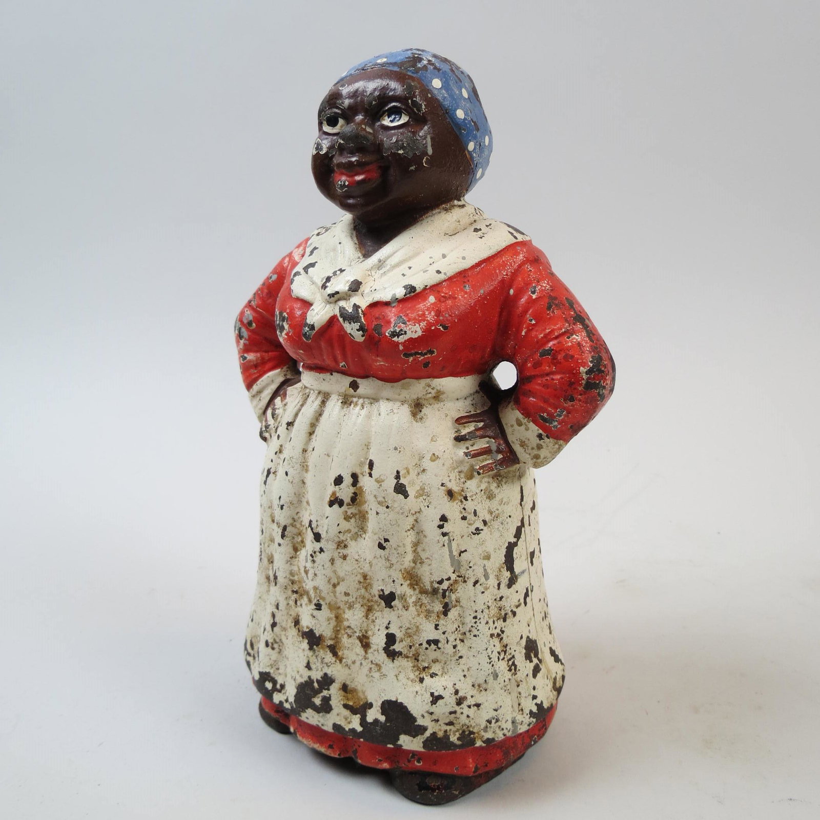 Figural Cast Iron Doorstop of Black Mammy,: in apron, 8 3/4", original paint.