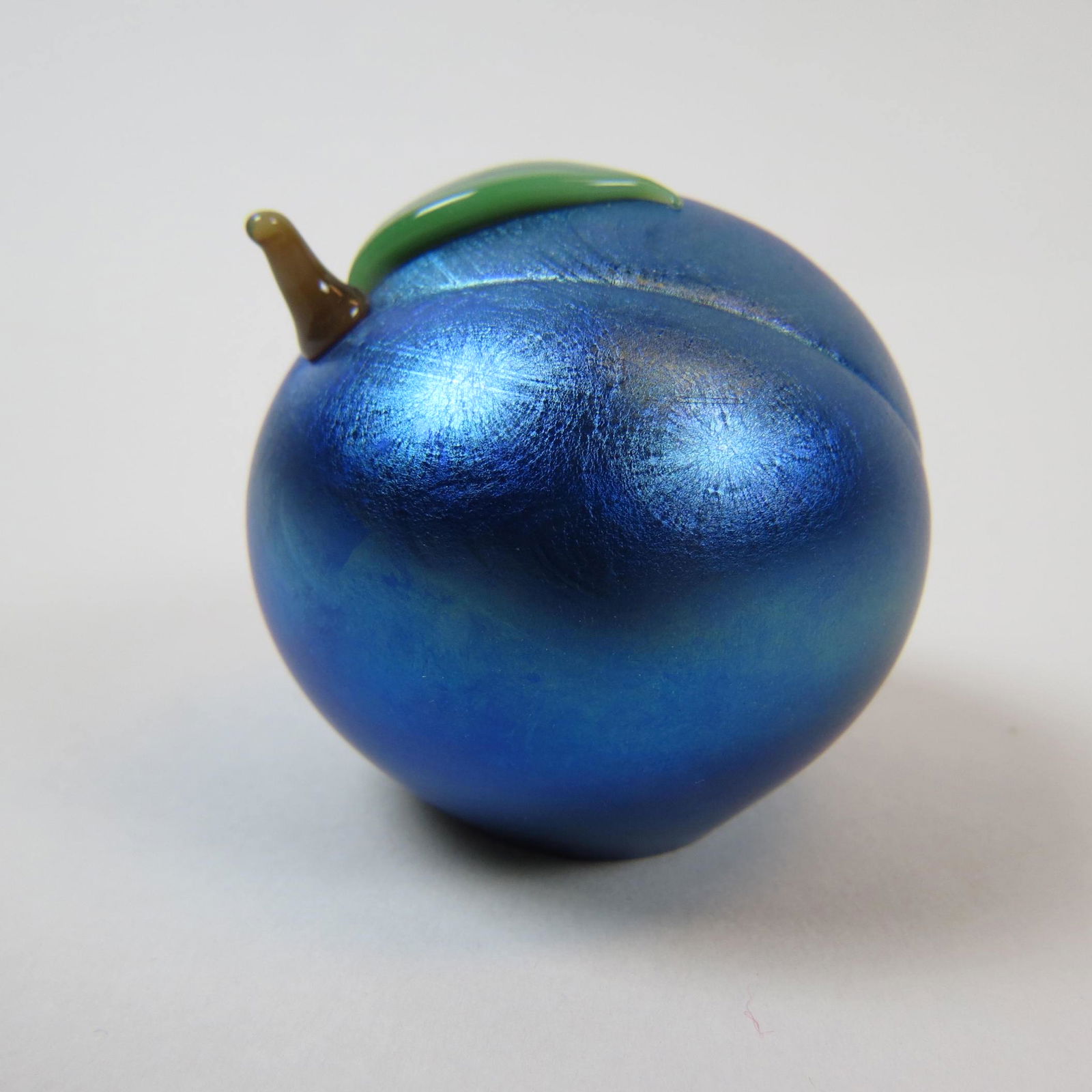 Orient & Flume Art Glass Paperweight,: iridescent blue peach, signed and numbered, 2 1/4', excellent.