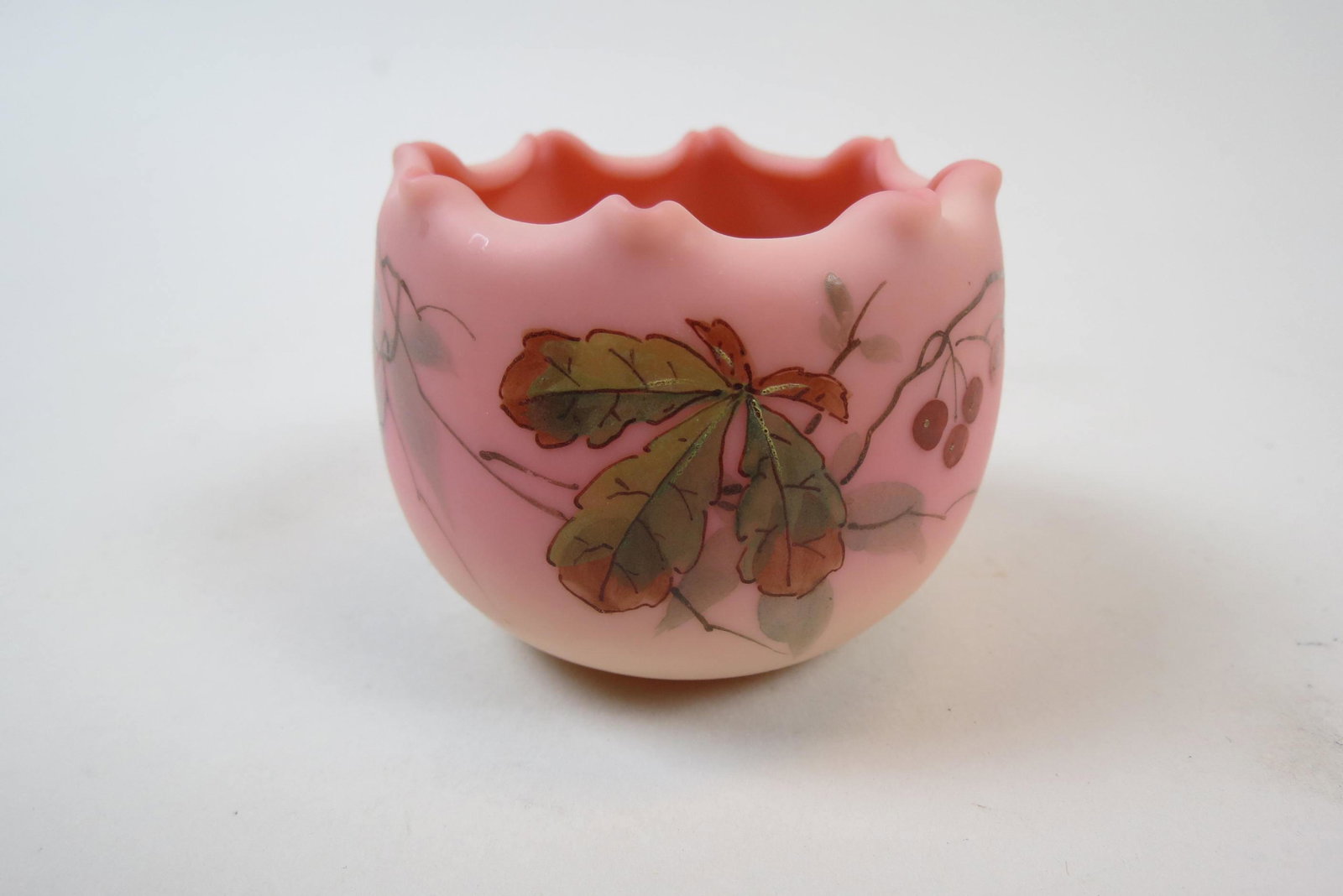 Mt. Washington Burmese Art Glass Cabinet Vase,: enameled berry decor, fold in pinch style rim, 2 /14" X 3", excellent.