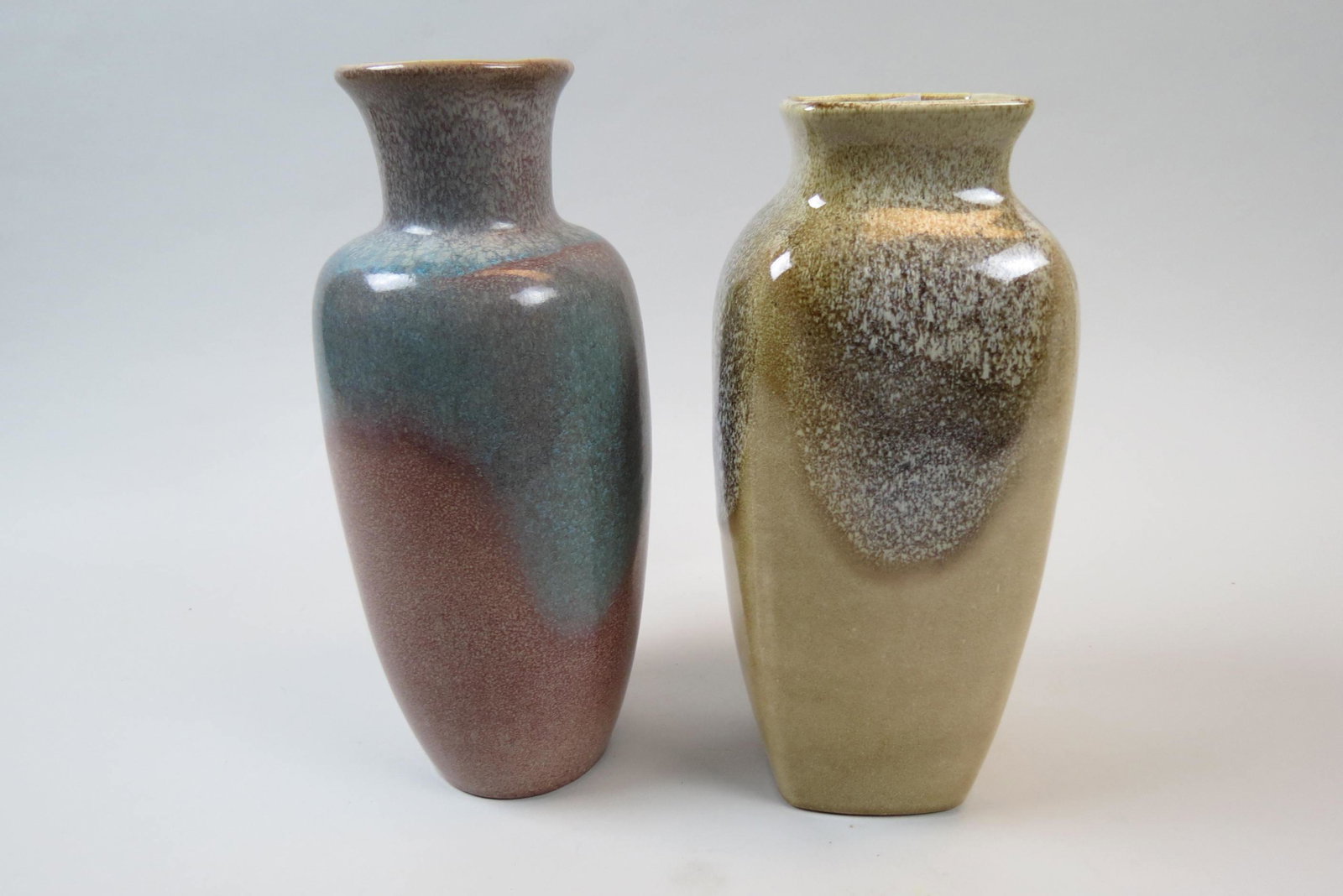 2 Royal Hickman Pottery Vases,: brown butterfat glaze and blue with burgundy slip glaze, 11 1/2", both signed, excellent.