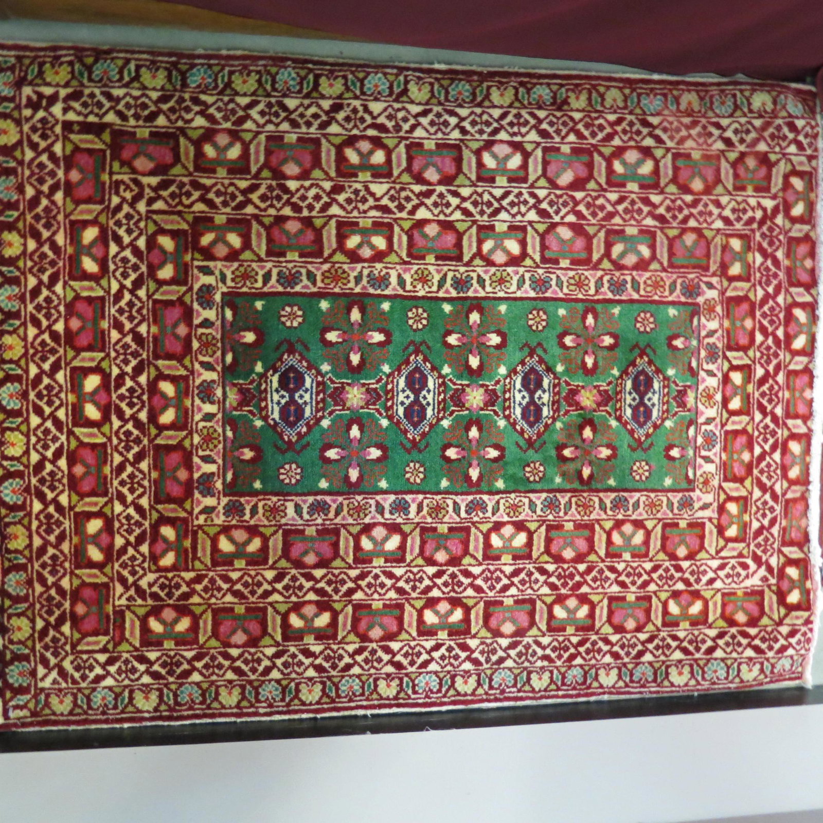 Turkoman Persian Handmade Rug,: green center with red and ivory, multi-border, 2'4" X 3'4".