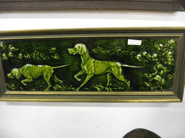 Art Pottery Plaque of Setters,: on point, high relief, rich greens, 5" x 18", circa 1900.