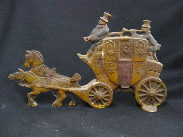 Cast Iron Figural Doorstop of an English: Coach, 12" long, 7" tall.