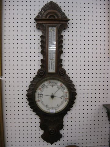 Victorian Barometer,: carved Black Forest style, 34" tall, thermometer above.