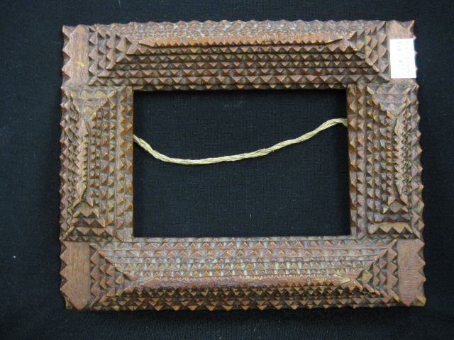 Tramp Art Frame,: made from cigar boxes, 8" x 10" overall. "... Tramp Art is also a wanderer's art form: so again, there are no written records of the carvers' work. The stories of this art form became the facts; the m