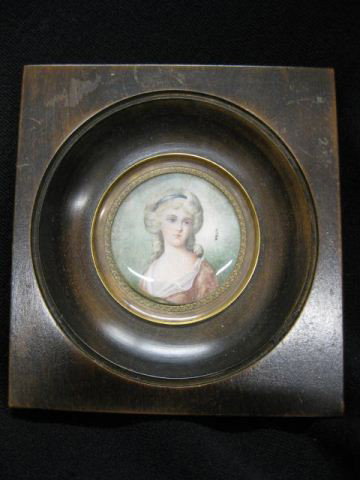 Miniature Portrait on Ivory of a Young Lady, artis: artist signed Nalin, 1 3/4" diameter, wooden frame, 19th century.