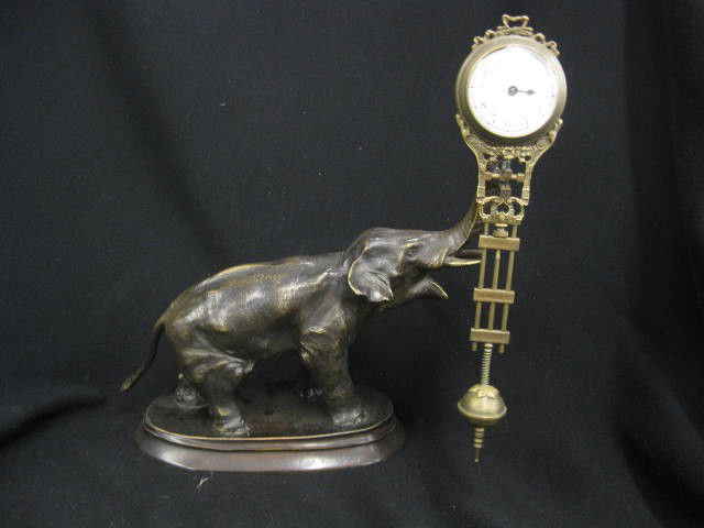 Junghans Figural Bronze Clock of Elephant, swing: swinging style movement & pendulum, scarce, 10 1/2" tall. The original antique Junghans Clocks company began in 1861 when Erhard Junghan and his brother-in-law, Jakob Zeller-Tobler set up their Black