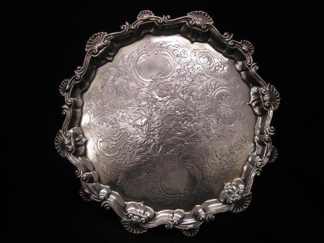 18th Century English Sterling Salver by Dorothy Mi: Dorothy Mills, 1753, London, footed, floral engraving, 10 1/4" diameter, excellent.