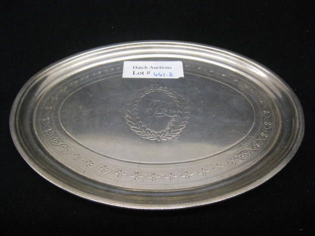 Georgian English Sterling Teapot Trivet, 1721: Trivet, oval, 5" x 6 1/4", wooden base, hallmarks of 1721 London.