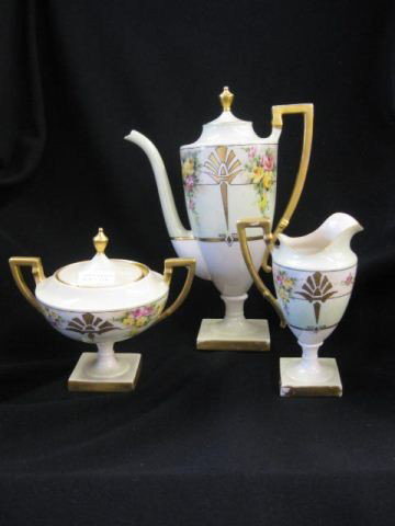 Lenox Belleek Porcelain Demitasse Set, handpainted: handpainted Arts & Crafts era floral and gold, artist signed G. Hillabrand, 1918, 10 1/2" pot.