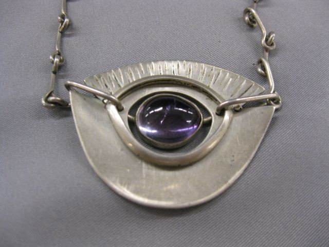Amethyst & Sterling Necklace by Winfred Clark Sh: by Winfred Clark Shaw, eye style, 16", 1960's. Winifred Clark Shaw was an accomplished artisan and a highly regarded UNH professor, who taught jewelry, metalsmithing, and weaving here from 1954 to 198