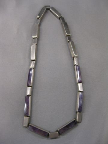 Amethyst & Sterling Necklace by Winfred Clark Sh: by Winfred Clark Shaw, 15". Winifred Clark Shaw was an accomplished artisan and a highly regarded UNH professor, who taught jewelry, metalsmithing, and weaving here from 1954 to 1987. Amiably referred