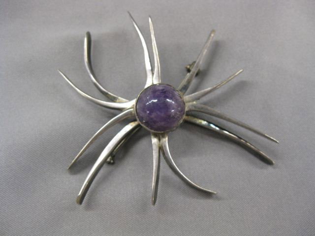 Amethyst & Sterling Brooch by Winfred Clark Shaw: Clark Shaw, 2 1/2". Winifred Clark Shaw was an accomplished artisan and a highly regarded UNH professor, who taught jewelry, metalsmithing, and weaving here from 1954 to 1987. Amiably referred to as �