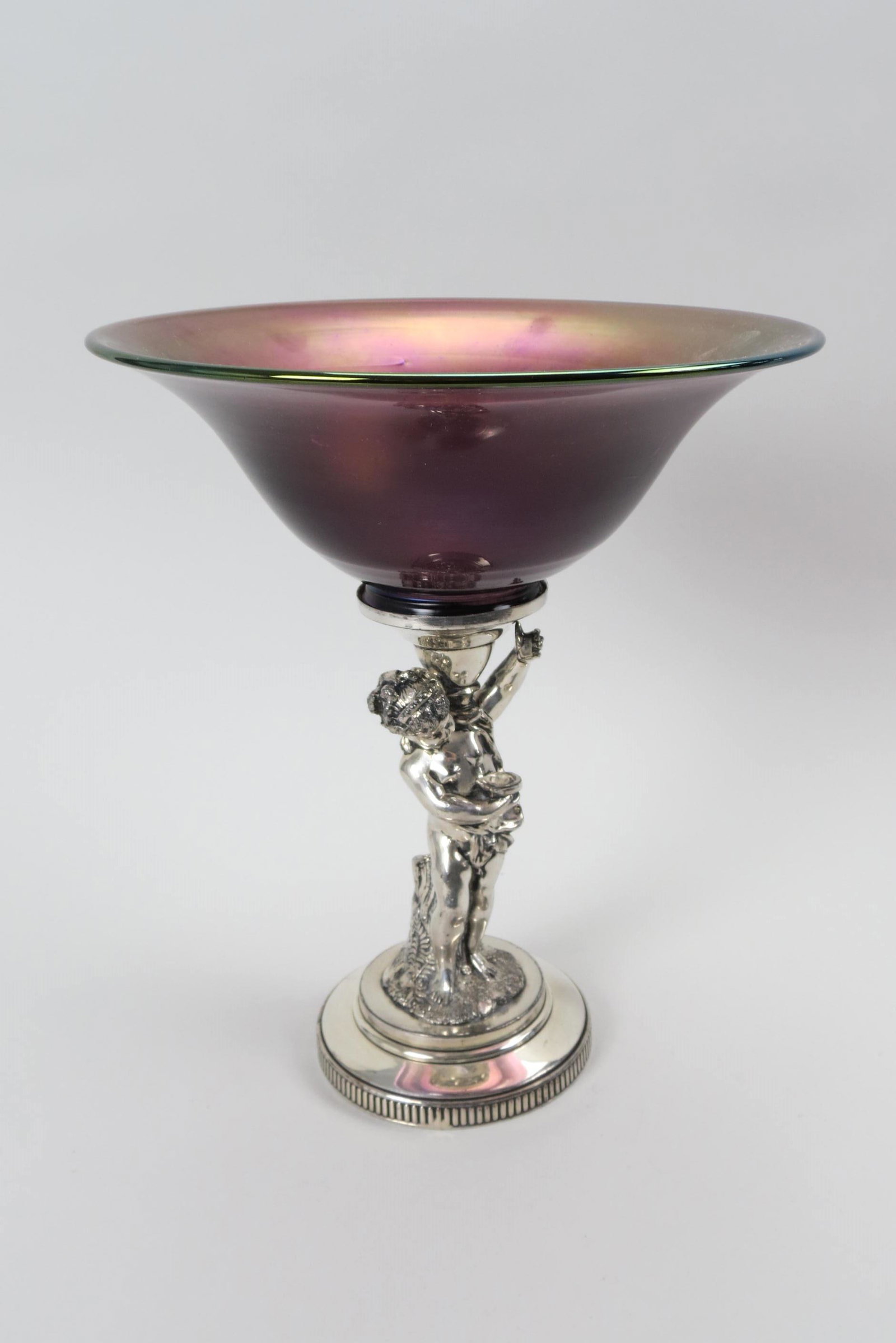 Victorian Art Glass & Silverplate Bride's Bowl on Stand,: figural silverplate stand with child by James Tufts holds an iridescent amethyst 10" art glass bowl, excellent.