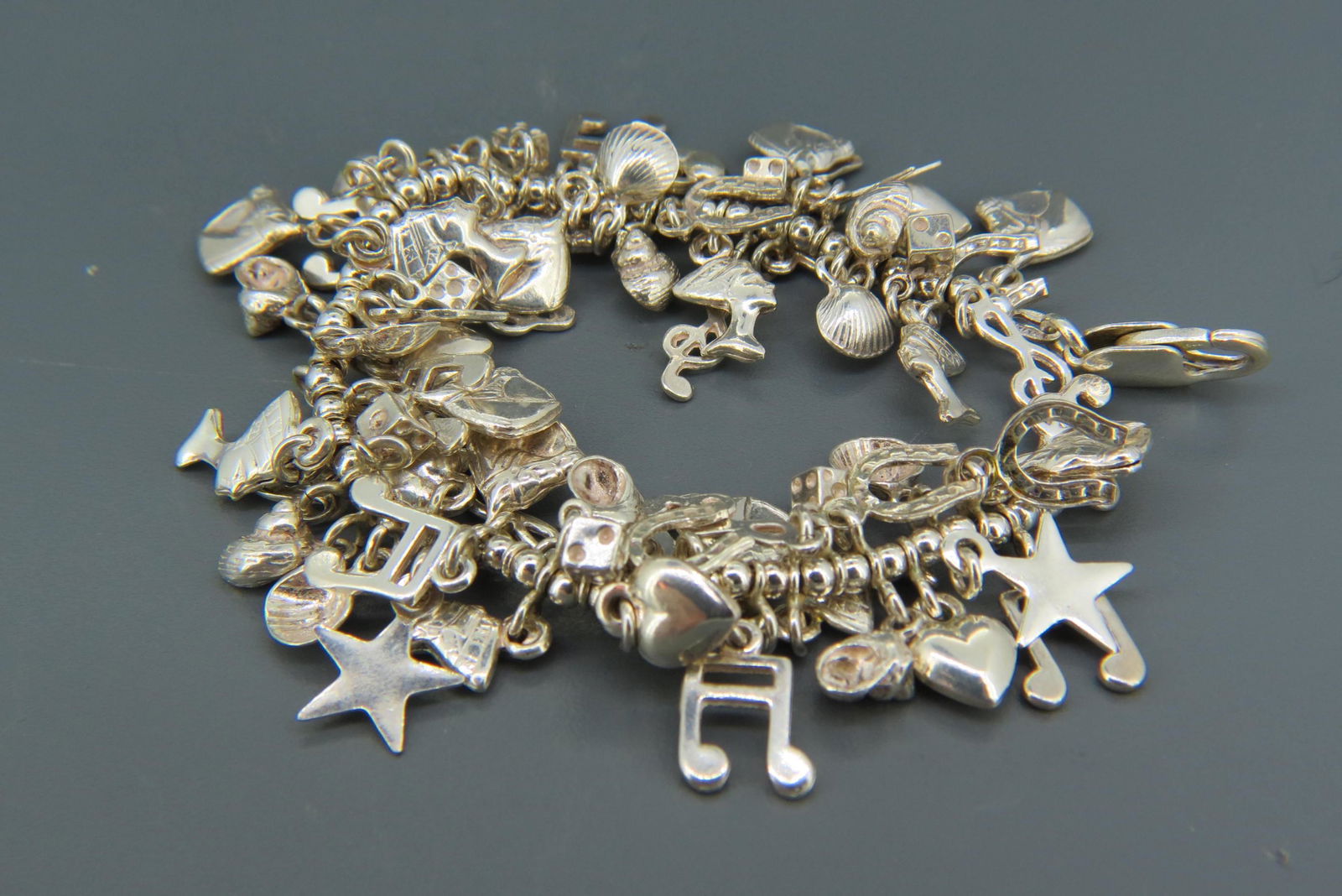Sterling Silver Charm Bracelet with over 75 charms (1 of 7)