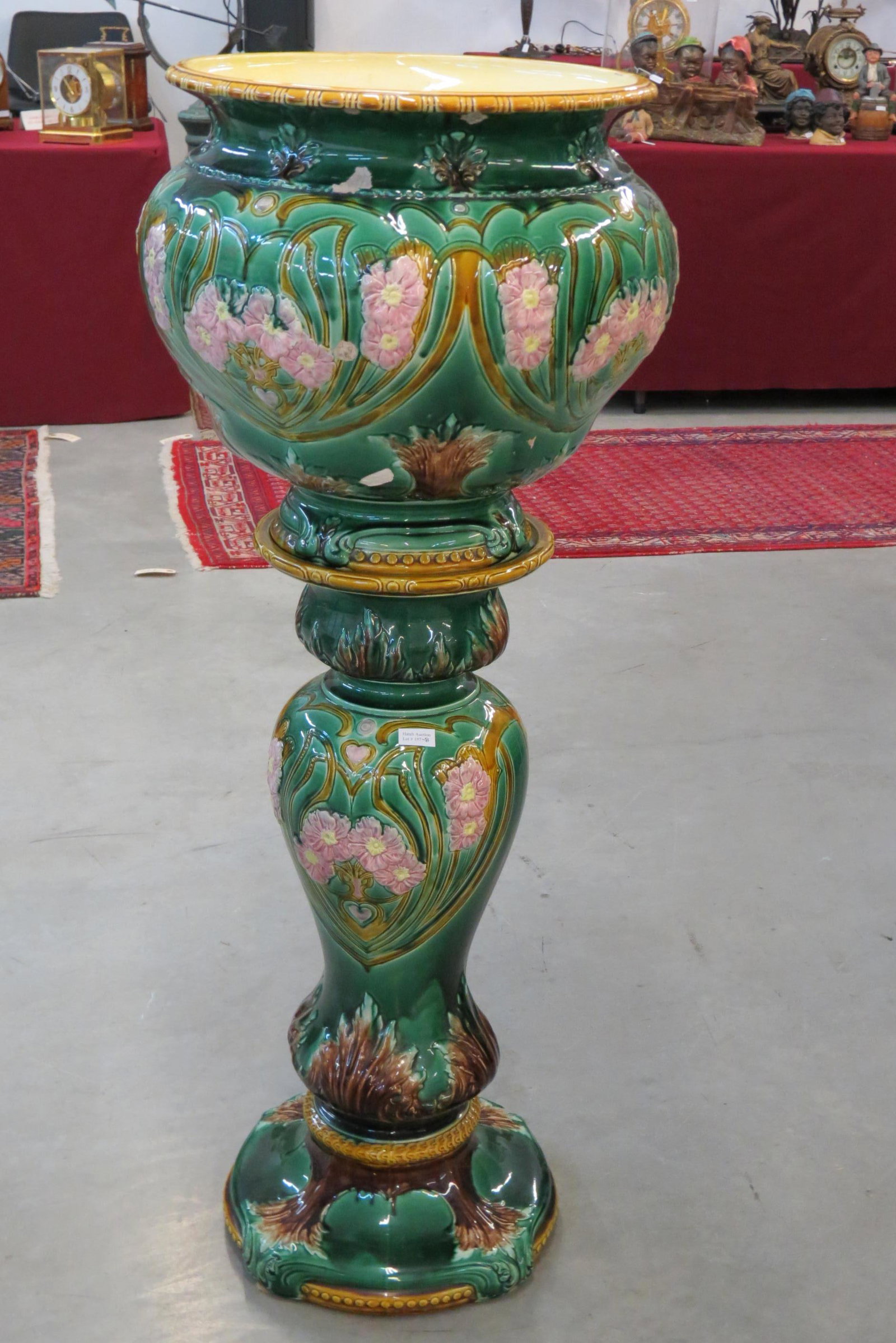 Majolica Pottery Jardiniere & Pedestal,: rich floral on green, jardiniere is 16" tall, 17" diameter, pedestal is 29" tall, overall 45", circa 1890, impressive.