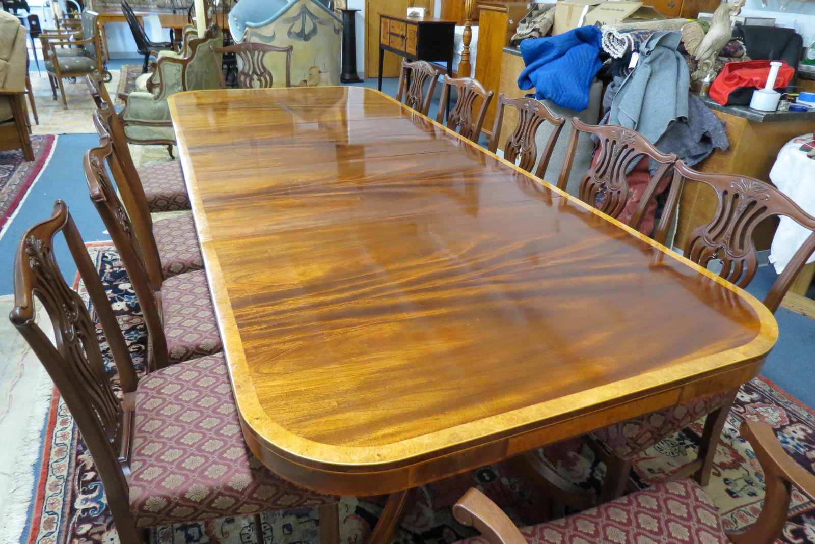 Fine Mahogany Dining Table, 10' Long,: with banded inlay, Duncan Phyfe double pedestal style, top is 48" wide, its 6' long without two leaves that are 2' each, all excellent, with custom pads.