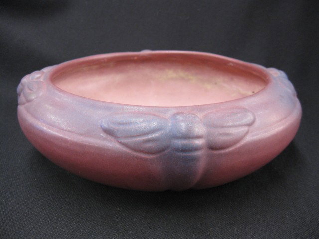 Van Briggle Art Pottery Bowl, Arts & Crafts era, : Arts & Crafts era, dragonfly or bee design on burgundy, 9" diameter, signed, excellent. In 1899, when Artus Van Briggle stepped off the train in Colorado Springs he must have felt worlds away from the
