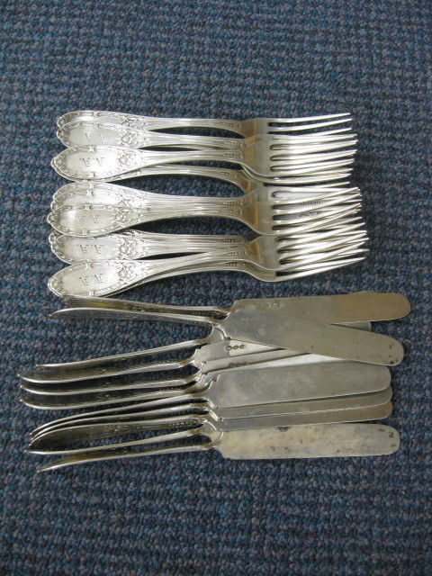 Albert Cole American Coin Silver Breakfast Set, 1: Set, 12 - 7" forks, and 11 - 7-5/8" knives, monogram A.A., circa 1850, forks have tine wear, one knife damaged, 911 grams