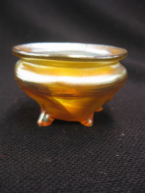Tiffany Favrile Art Glass Salt Cellar, footed, go: footed, golden amber iridescent, signed, pontil chip.