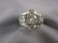 614: Diamond Ring, .70 center stone and 4 other stones