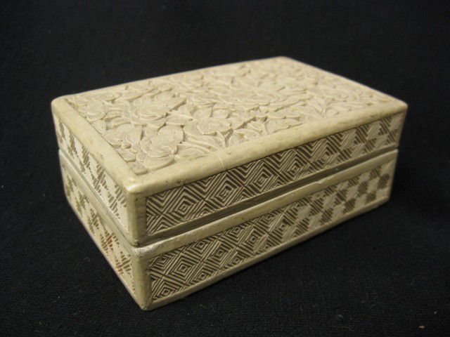 Chinese White Cinnabar Box, floral, 2 5/8" x 4",: floral, 2 5/8" x 4", minor flakes.Cinnabar is the popular name used to describe Chinese lacquerware of a striking red color known for many centuries. When first produced, the distinctive color was der