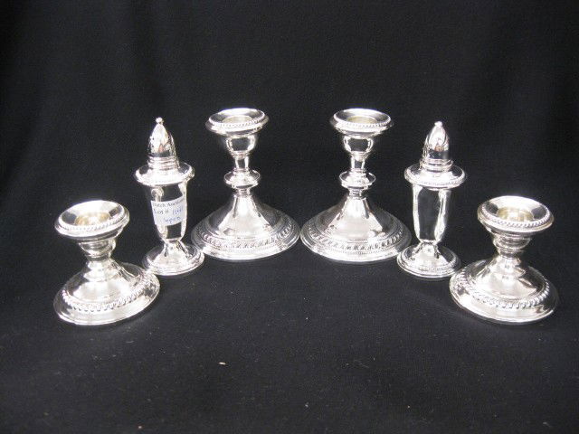 6 pcs. Sterling Silver, 2 1/2" & 3" candleholders: 2 1/2" & 3" candleholders, 4 1/2" salt & pepper, weighted.