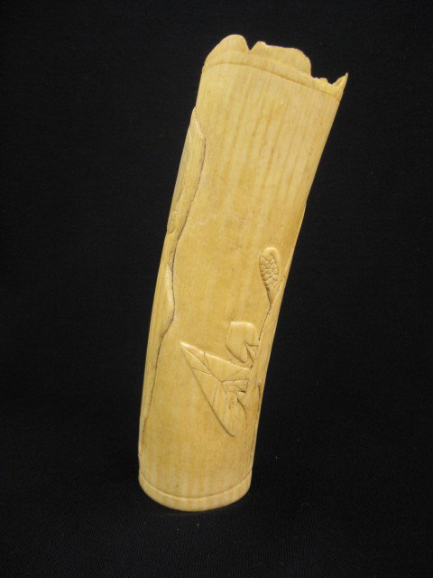 Carved African Ivory Tusk, woman in dress carryin: woman in dress carrying a basket, 7 1/2" tall.
