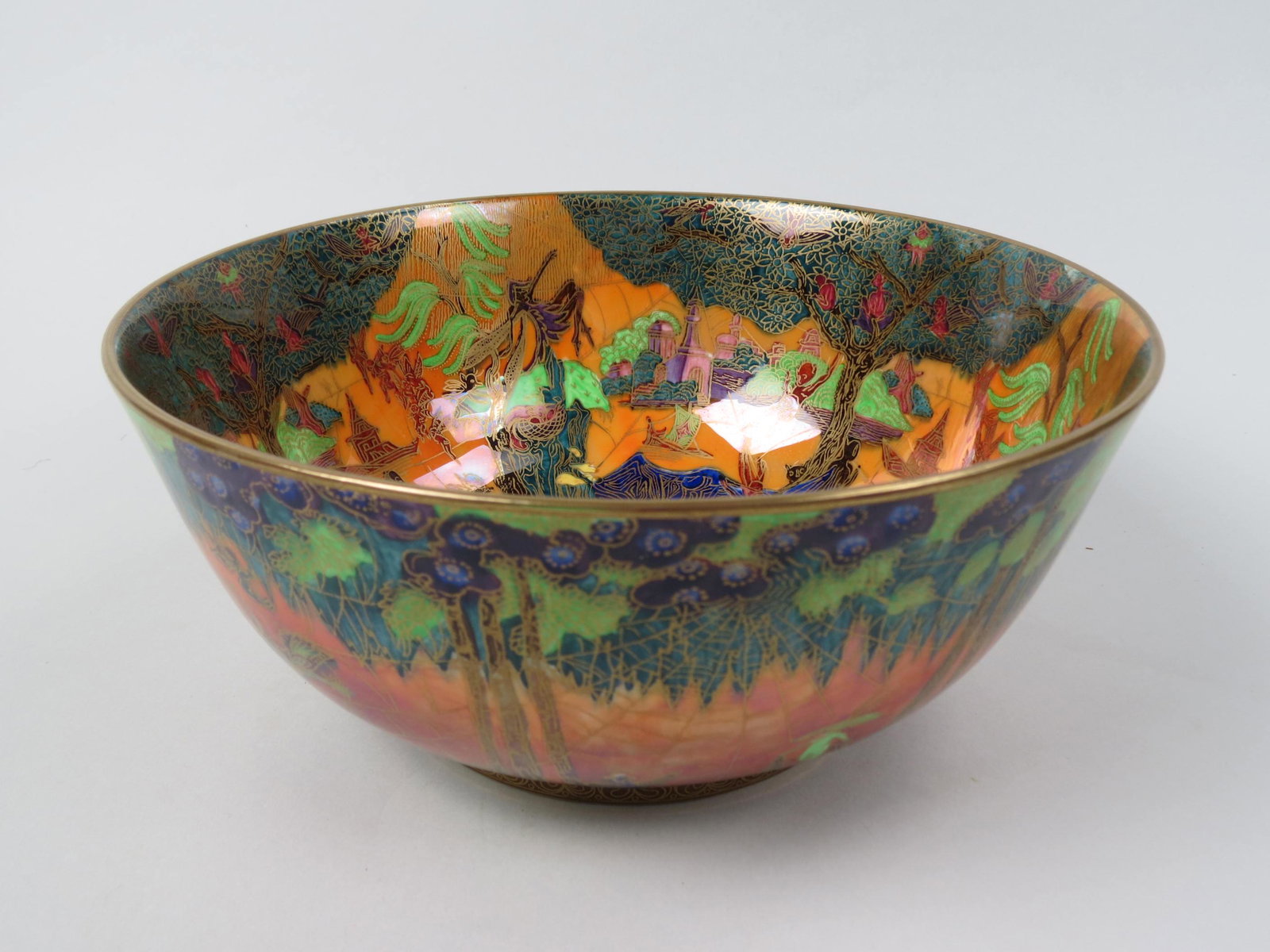 Wedgwood Flame Fairyland Lustre Imperial Bowl,: designed by Daisy Makeig-Jones, circa 1925, elves in forest , orange background, 9" diameter, 4" deep, excellent.....MISS DAISY'S LEGACY: FAIRYLAND LUSTRE BY WEDGWOOD | Lyndon Lasiter.There are few ex