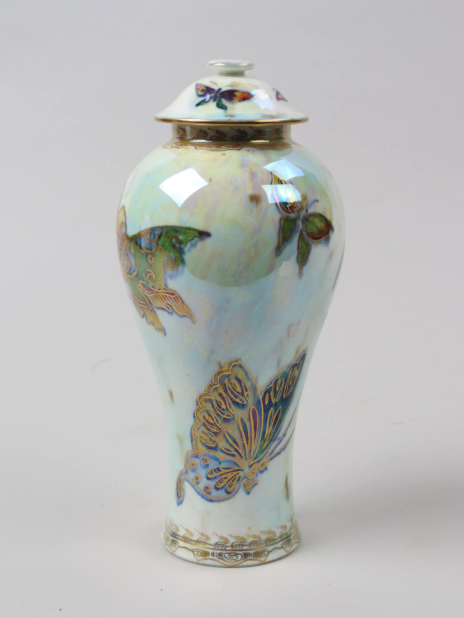 Wedgwood Fairyland Lustre Butterfly Jar,: circa 1925, 8 1/2" tall, excellent..................MISS DAISY'S LEGACY: FAIRYLAND LUSTRE BY WEDGWOOD There are few examples of such whimsy in finely crafted china as in Wedgwood's Fairyland Lustre li
