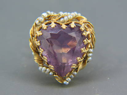 Amethyst 14K Gold Ring,: vivid heart shape gem weighing over 10 carats with a garland of seed pearls around, 14k yellow gold, currently size 6 1/2, 7.7 grams.