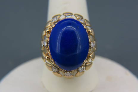 Lapis Lazuli & Diamond Ring,: oval cabochon surrounded by 8 round diamonds totaling .25 carat in14K yellow gold, with appraisal of $750.00, currently size 6 1/4.