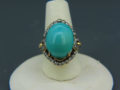 Turquoise & Diamond 14K Gold Ring,: rich Persian blue cabochon weighing 15.30 carats surrounded by 18 round diamonds totaling .36 carat, high grade, 14K yellow gold, with appraisal of $2,550.00, currently size 6 1/2.