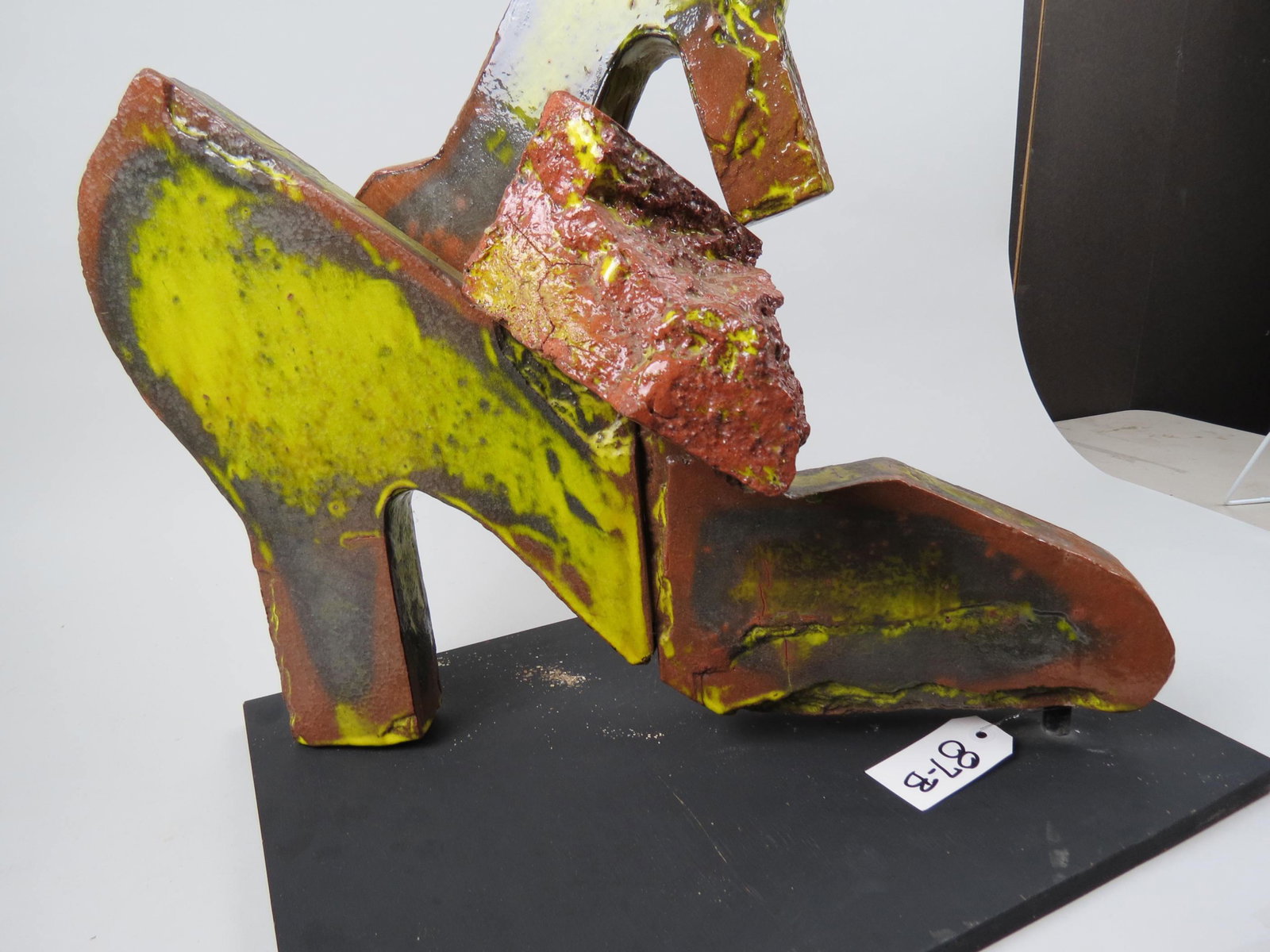 Patricia Ferber, sculpture, "Bolero",: stacking high heel shoes and rock, ceramic, 1996, a California artist, with original catalog, 21 1/2" tall, 14 1/2" X 19 1/2" base.
