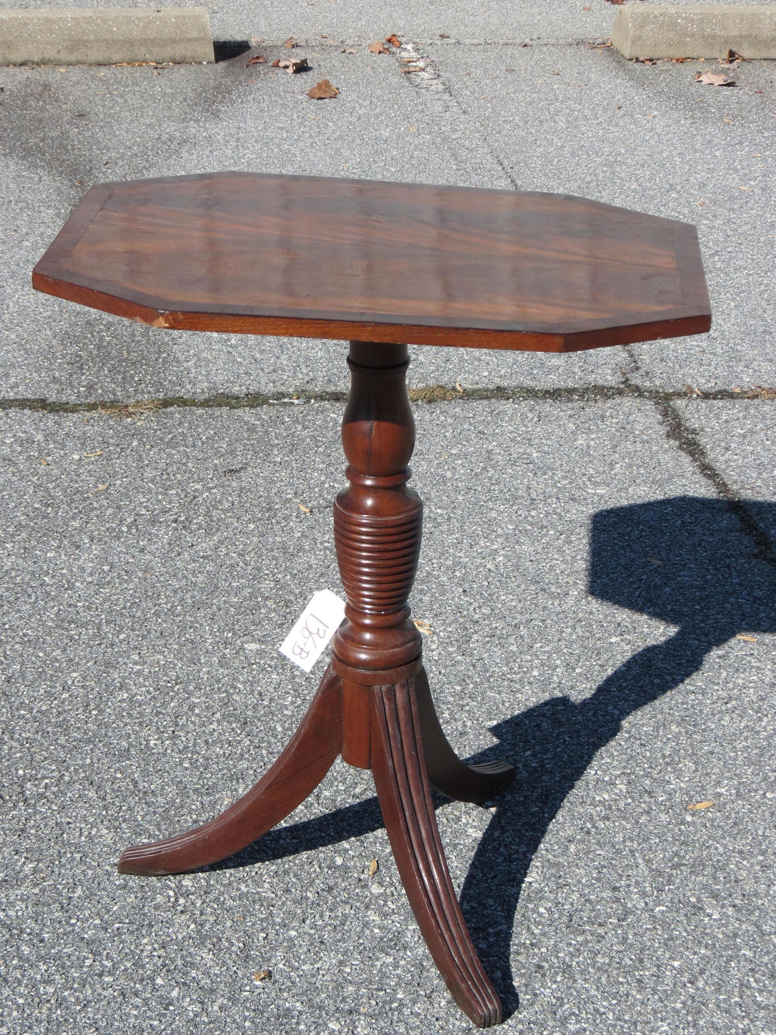Mahogany Tilt Top Candlestand,: tri-footed Duncan-Phyfe style base, banded flame mahogany top, 28 1/2" tall, 17" X 24" top.