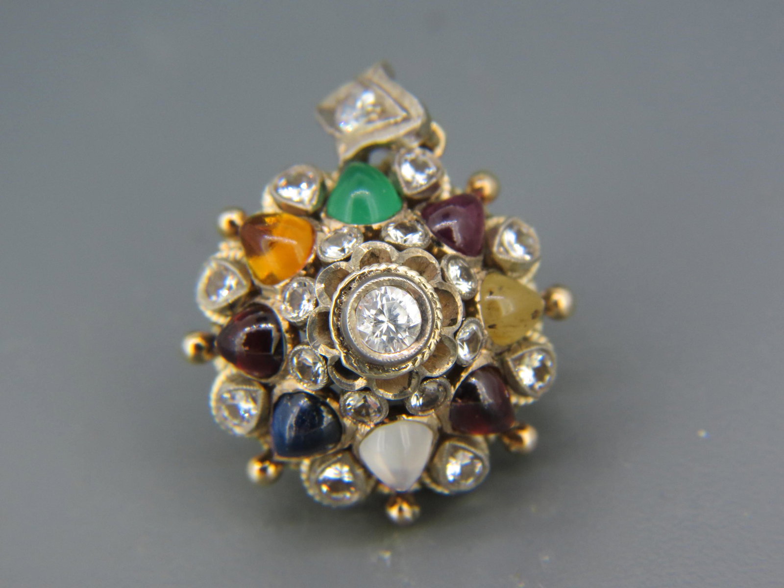 Gemstone "Princess" 10K Gold Pendant,: with 8 pear shape cabochons including sapphire, chrysophrase, moonstone, tigerseye and more, with 17 round white sapphires totaling 1.25 carats, 10K yellow gold, 8.4 grams, with appraisal of $1,050.00