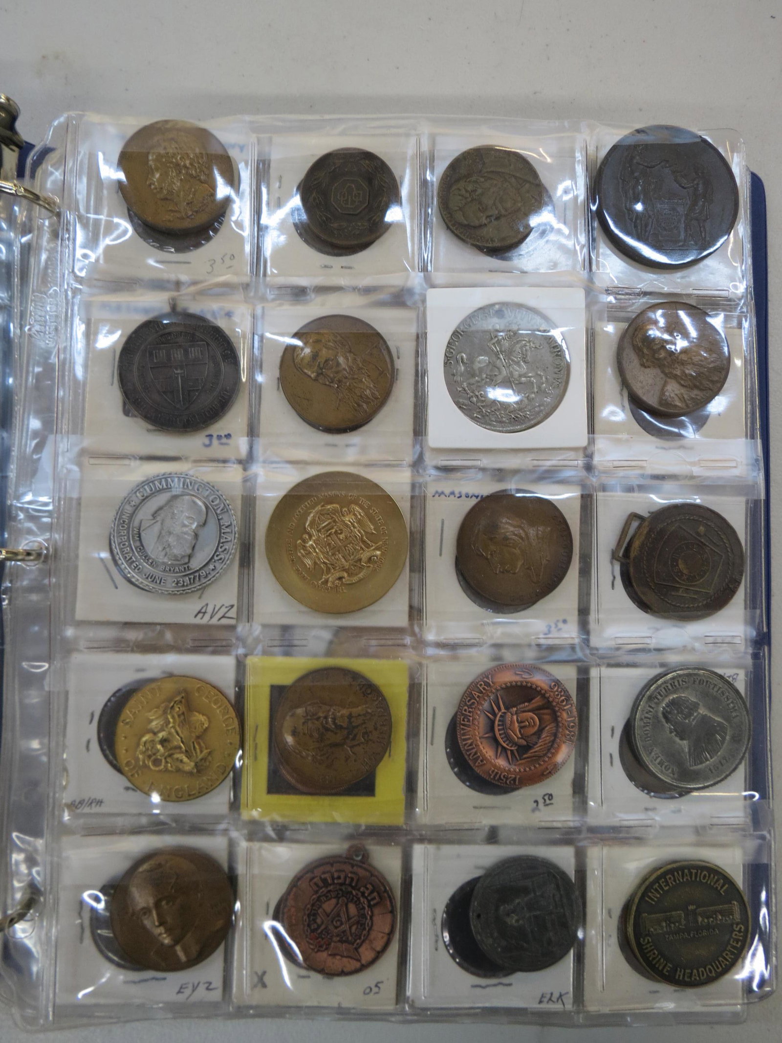 174 Tokens & Medals in Notebook, (1 of 9)