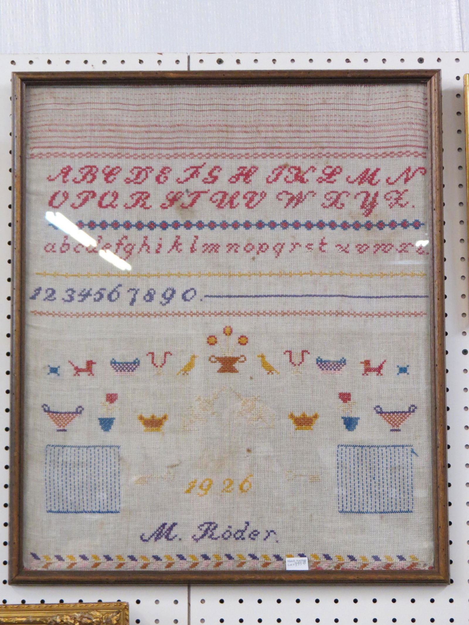 1926 Needlepoint Sampler by M. Roder,: with alphabet, numbers, objects and more, 22" X 26".