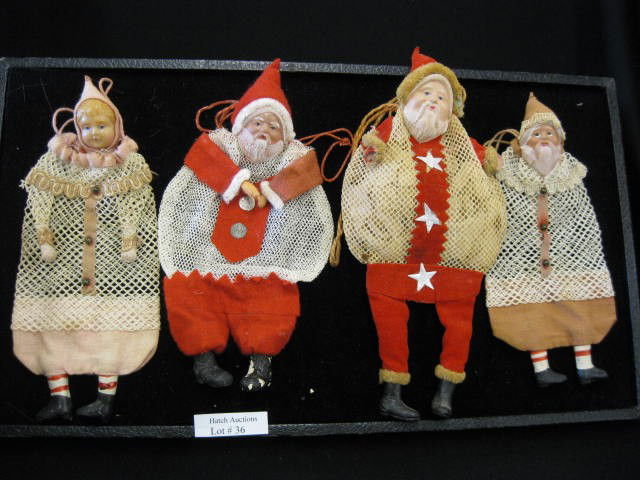 4 Antique Figural Candy Containers, 3 santas & 1 ch: 3 santas & 1 child, bag style, celluloid faces, 7" to 8 1/2".