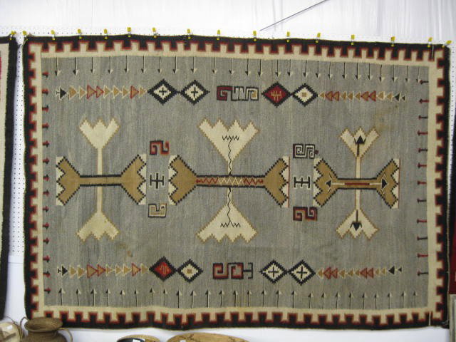 Large Navajo Crystal Indian Blanket John B. Moore: 60" x 86", minor staining and one minor damage on selvage edge, an old repair slice around middle area, (not bad), a very fine example, variation of a John B. Moore design....Crystal Trading Post Elev