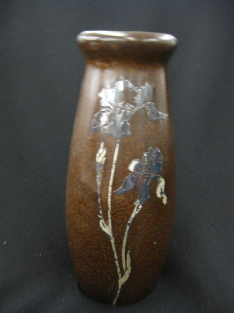 Heintz Sterling & Bronze Vase, orchid decor,: orchid decor, shape #8627B, signed, 11 1/2".In 1902, Otto Heintz set up the Arts & Crafts Shop in Buffalo, New York, where he manufactured modest desk sets, stamp boxes and tall candlesticks decorated