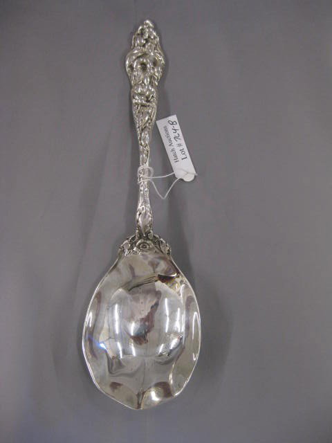 Sterling Silver Casserole or Berry Spoon,: ornate floral handle, 9 3/4", excellent, no monogram, 165 grams.