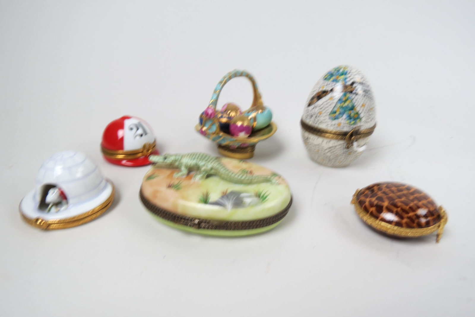6 Limoges Porcelain Boxes,: includes figural jockey cap, igloo, basket of eggs, aligator, egg and more, excellent.