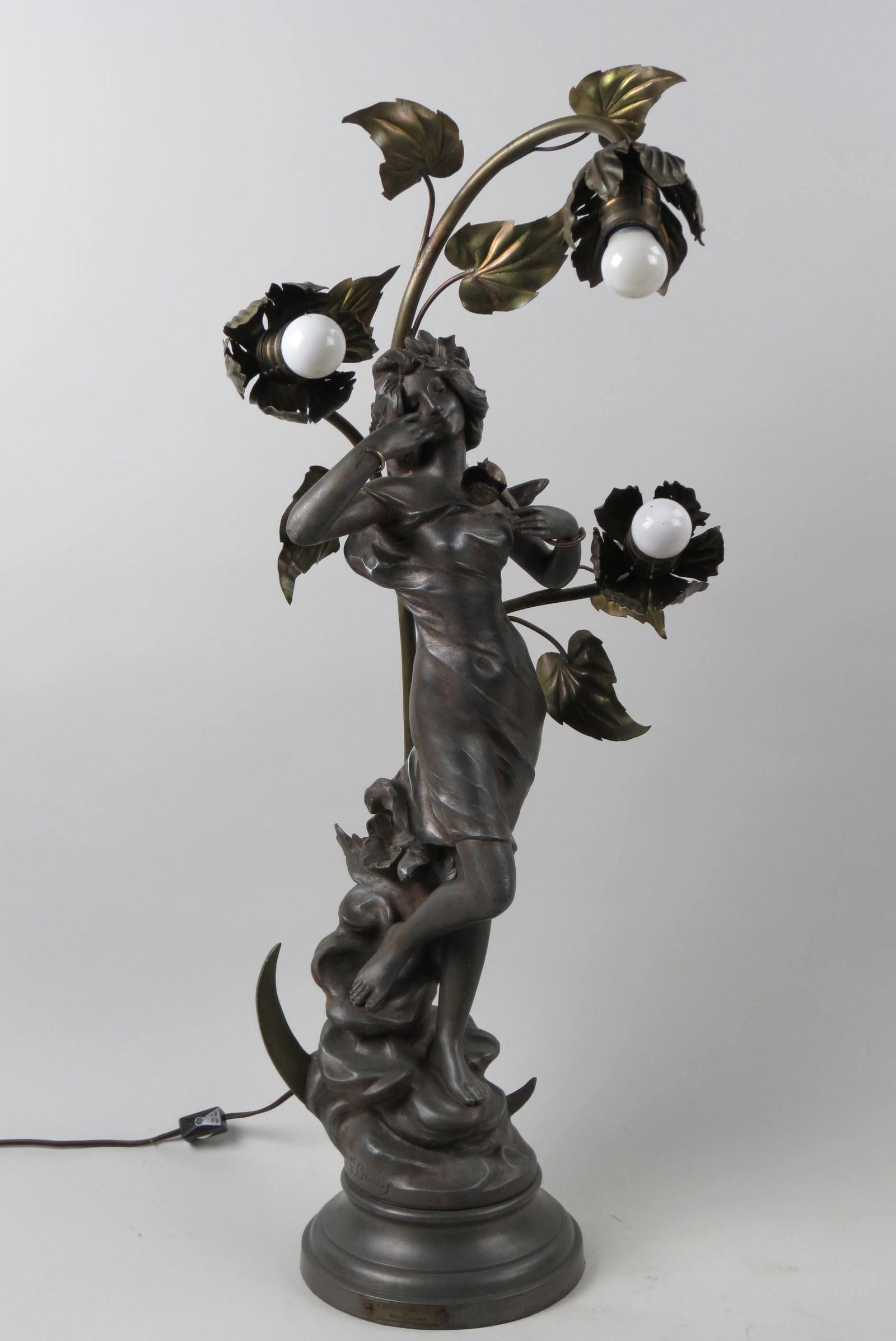 Art Nouveau Newel Post Figural Lamp of Female,: Crepuscule, artist J. Causse, among flowers, crescent moon on base, triple light, 30" tall, signed, spelter, circa 1890. Newel Post Lights Also known as Pillar Lights, Newel Post Lights were used to l