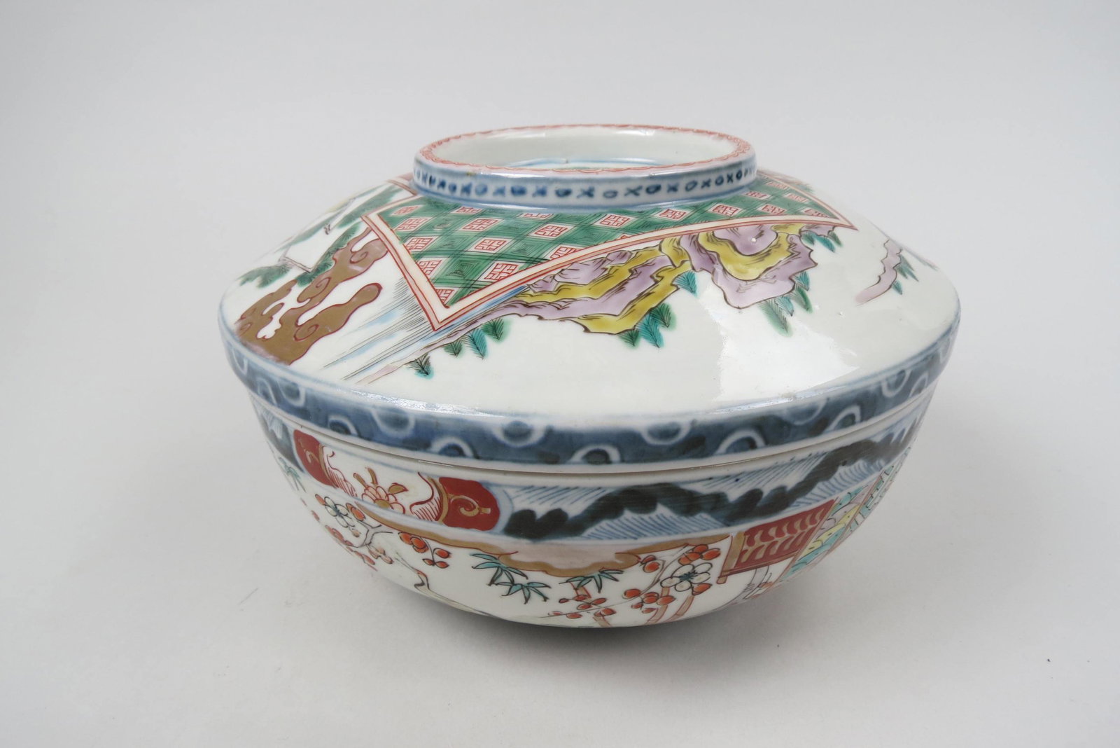 Japanese Imari Porcelain Covered Bowl,: decorated with cranes, animal, buildings, flowers and foliage, 9" diameter, 5 1/2" deep, excellent...........During the 17th and early 18th century Japanese porcelain became increasingly popular in Eu