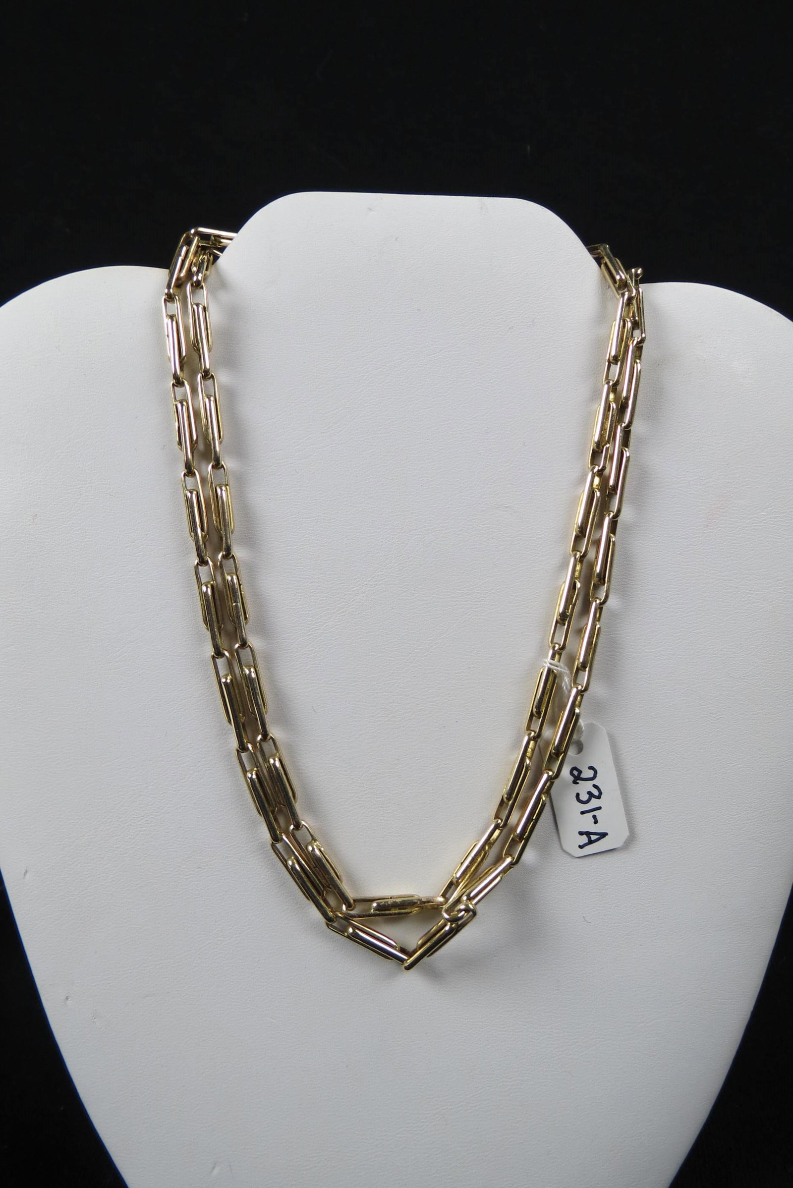 14K Gold Designer Style Necklace,: elongated links, 32" long, 48 grams.